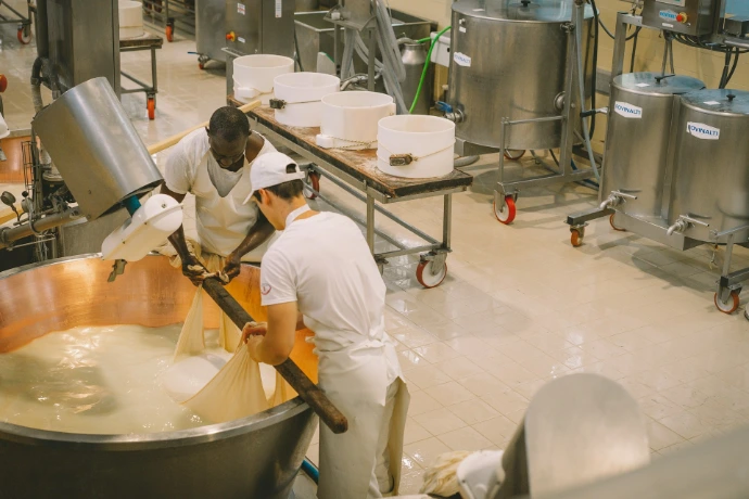 a group of people working in a factory